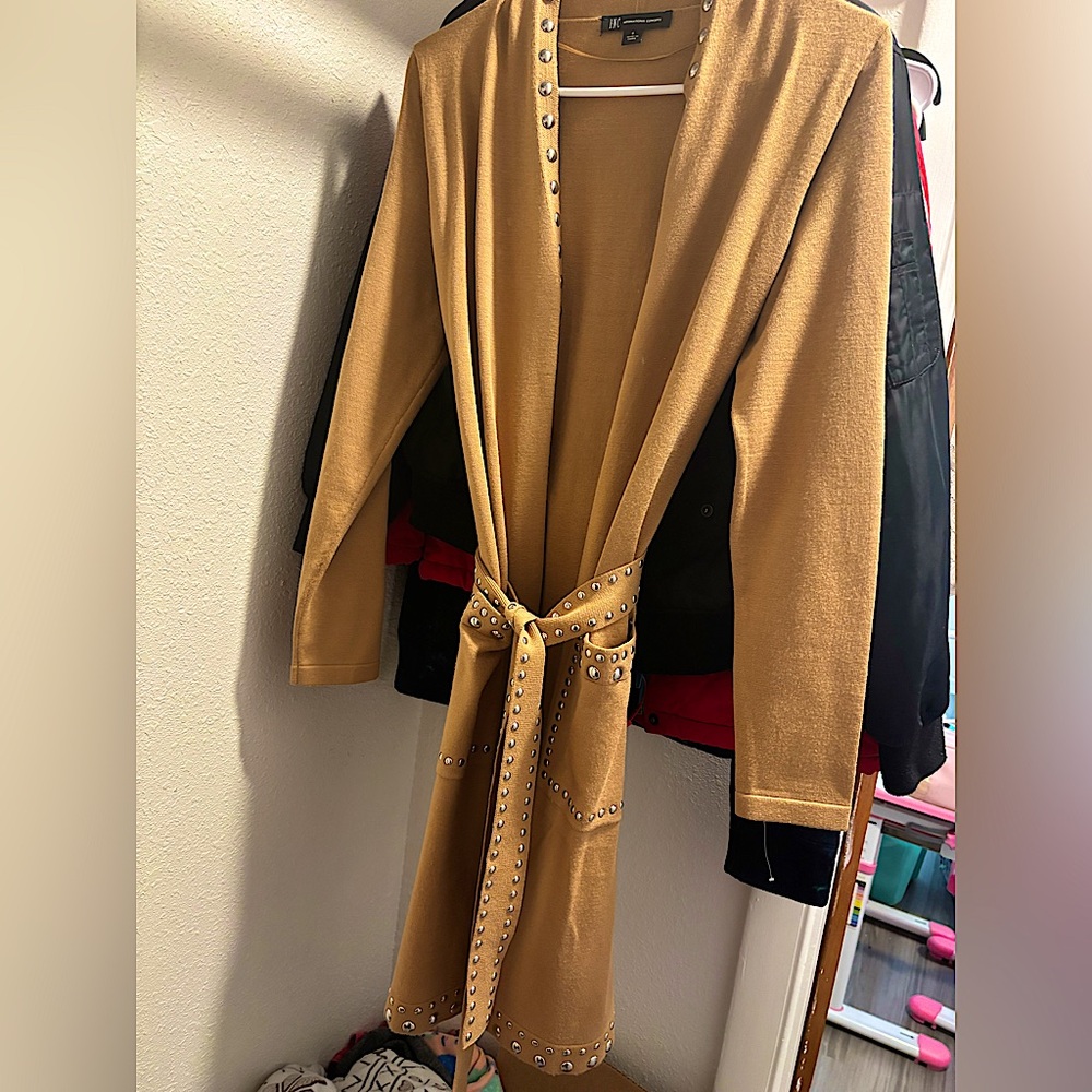 Beautifully INC trench jacket. It’s Beaded the tie is beaded as well.